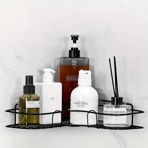 Adhesive triangle corner shelf holding bathroom essentials